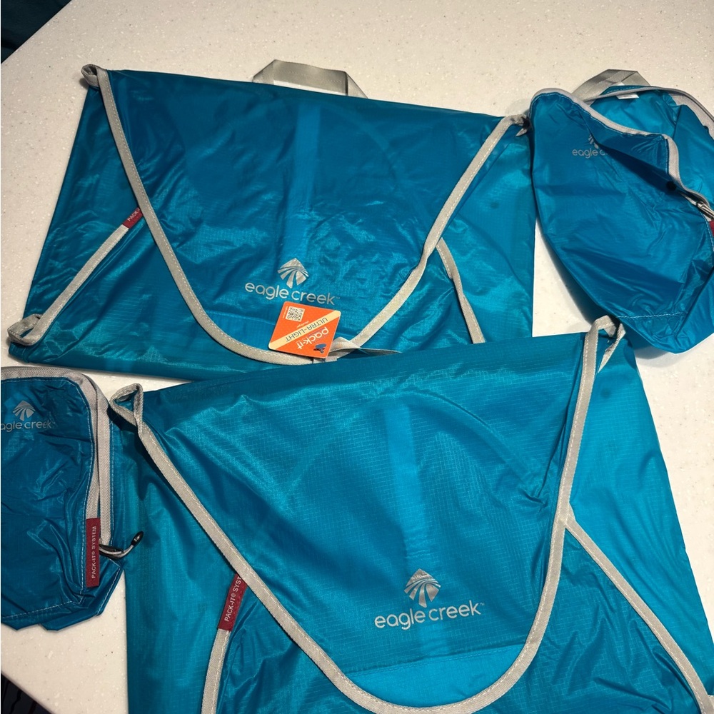 Eagle Creek packing cubes and shirt portfolios